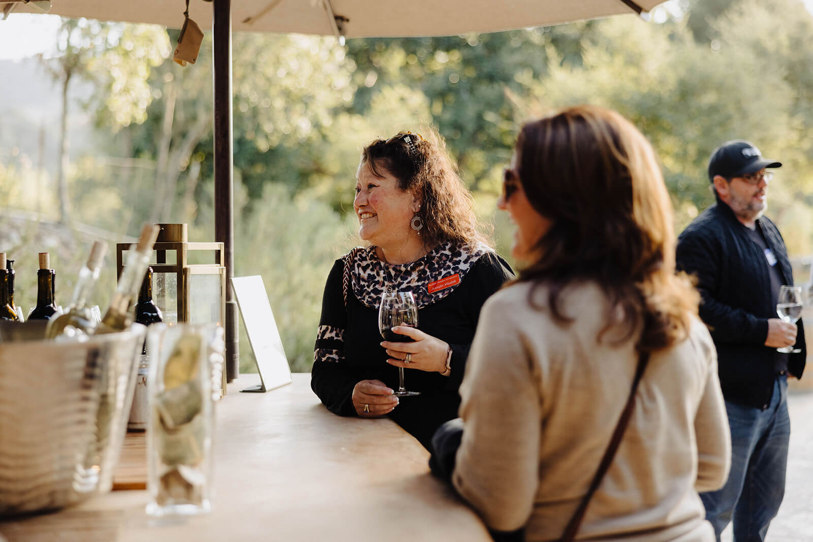 Add New Event Annual meeting attendees at an outdoor bar in the Santa Ynez Valley